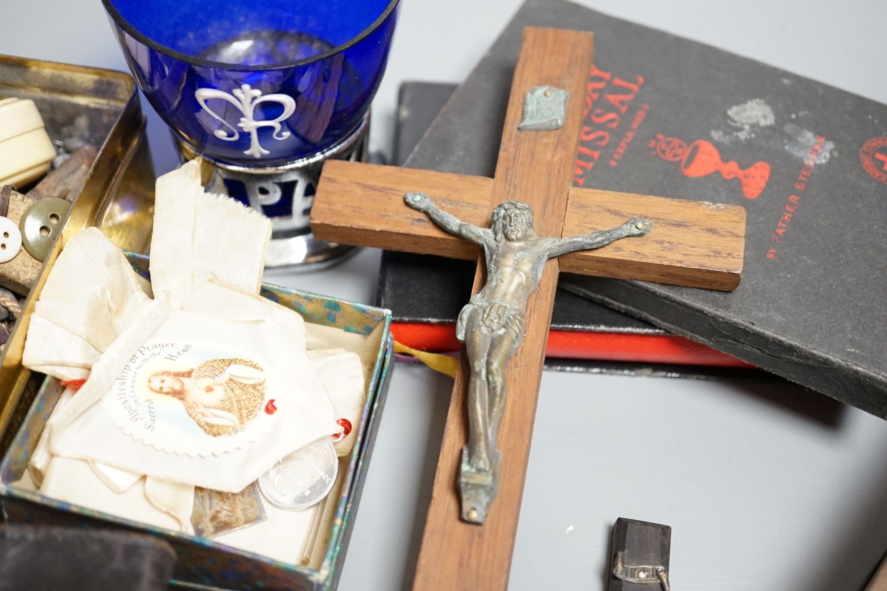 A Dieppe ivory carving of the Madonna and Child on ebonised socle, height 19cm, a crucifix, various rosaries etc.